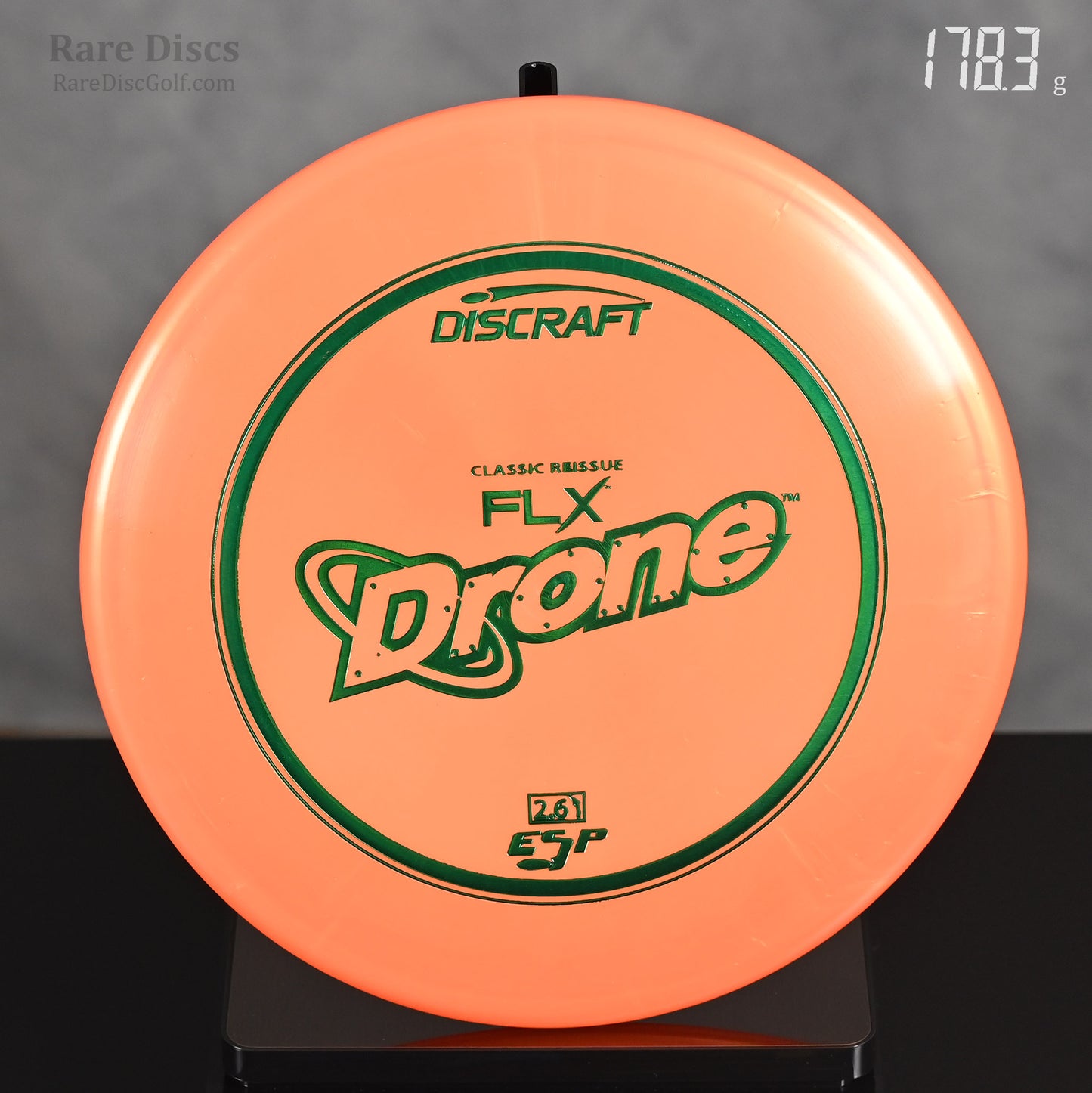 Discraft FLX Drone disc golf disc on a scale
