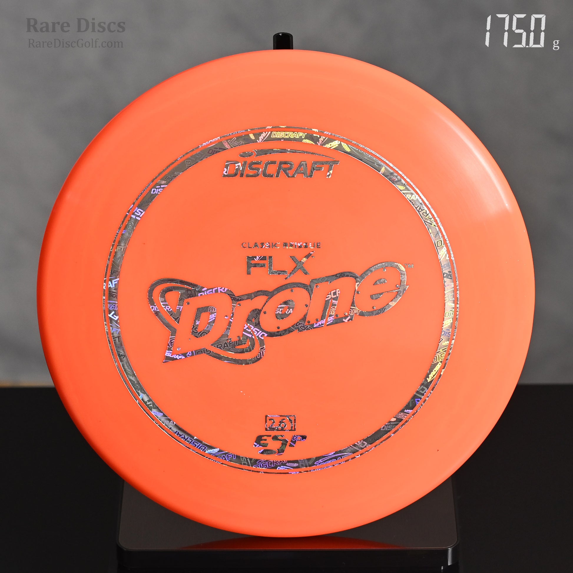 Discraft FLX Drone disc golf disc on a scale