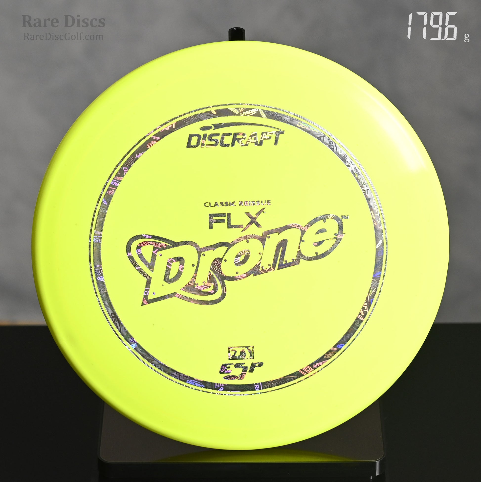Discraft FLX Drone disc golf disc on a scale