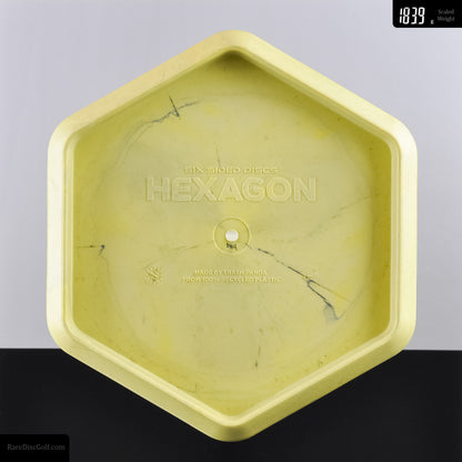 Six Sided Discs x Trash Panda swirly base hexagon recycled plastic disc golf object for throwing Rare Discs Canada Yellow