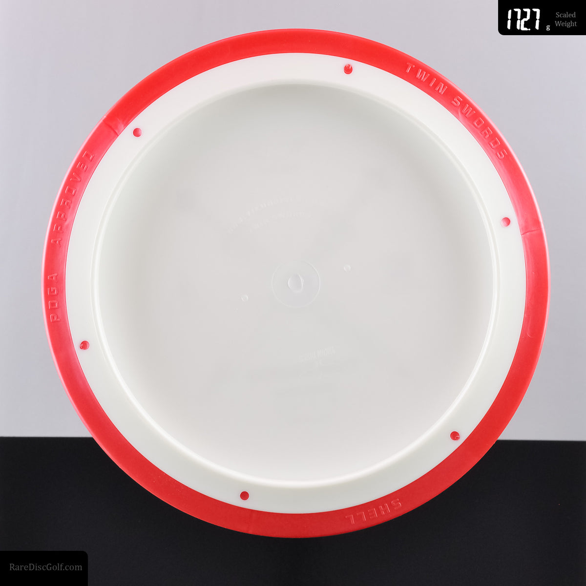 Yikun Twin Swords overmold distance driver for disc golf underside