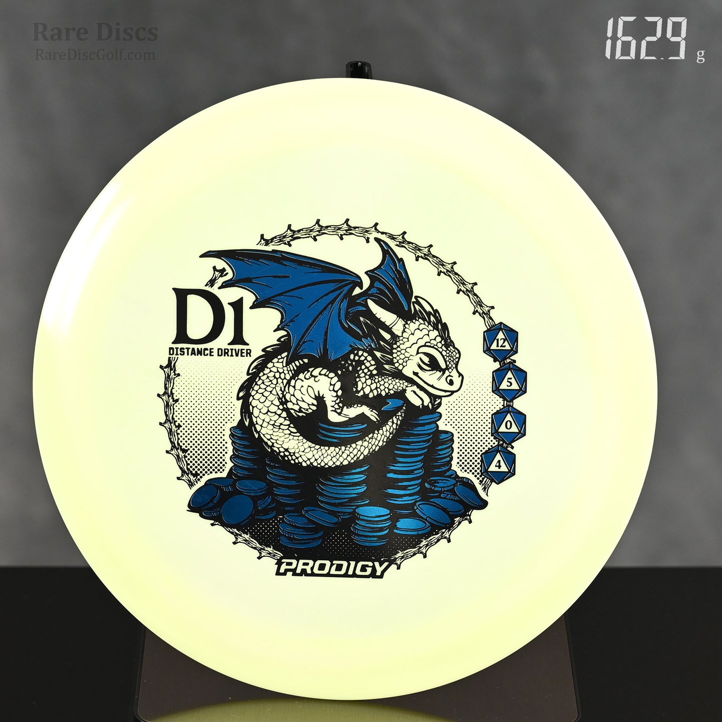 Prodigy Dragon D1 glow 400 Special Edition Distance Driver with baby dragon sitting on coins stamp and D20 dice flight numbers