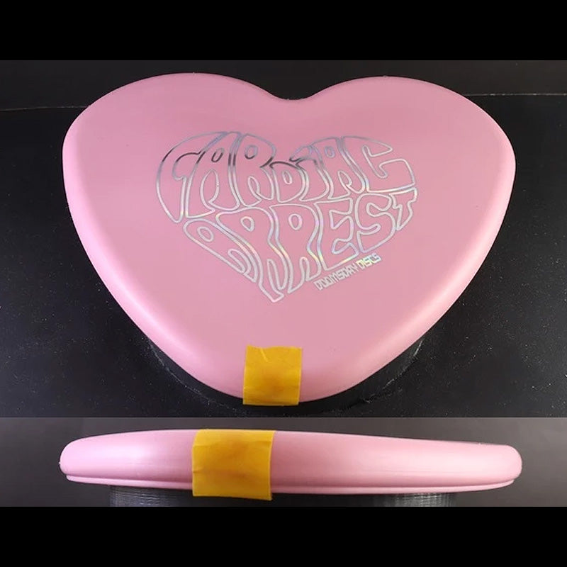Doomsday Discs Cardiac Arrest disc golf putter heart shaped novelty flying object Rare Discs Canada - example of the warping