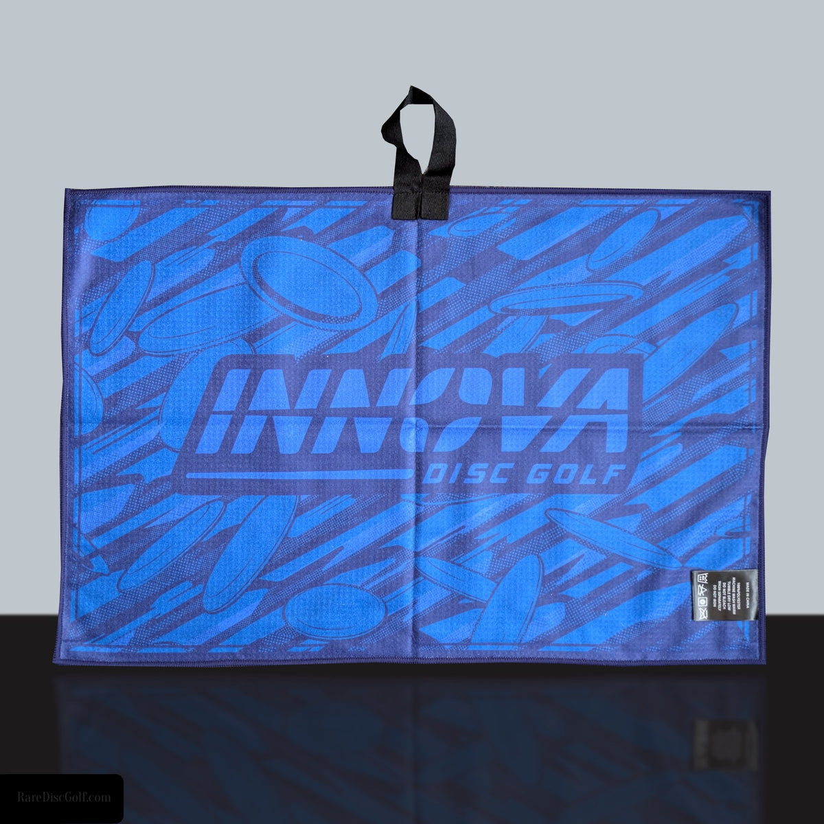 a disc golf towel with innova logo