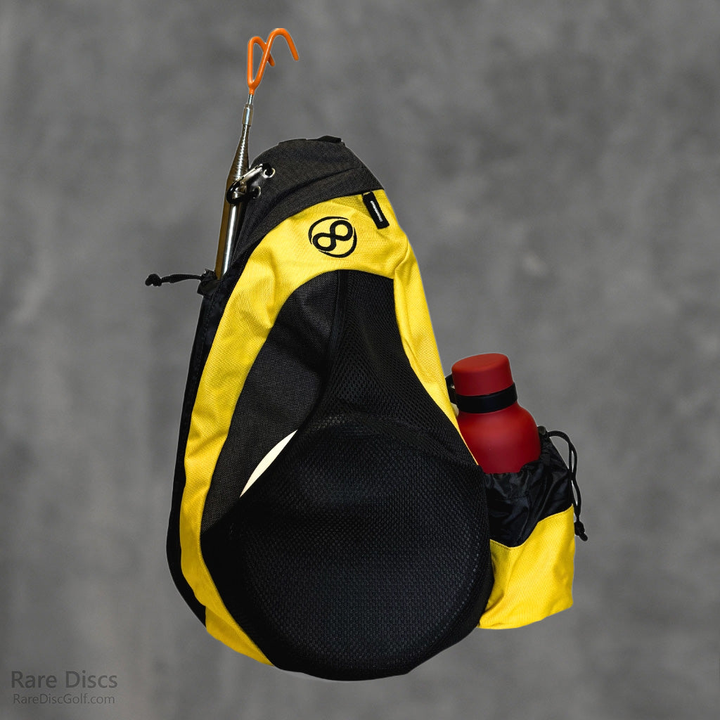 Infinite Discs Tournament Slinger Black and Yellow in Canada at Rare Discs disc golf store single strap small sports backpack